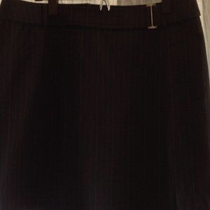 Dressy black above-knee skirt with thin white pinstripes. Sz 12 by NYC
